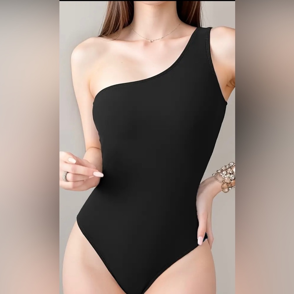 Asymmetrical black swimsuit size M